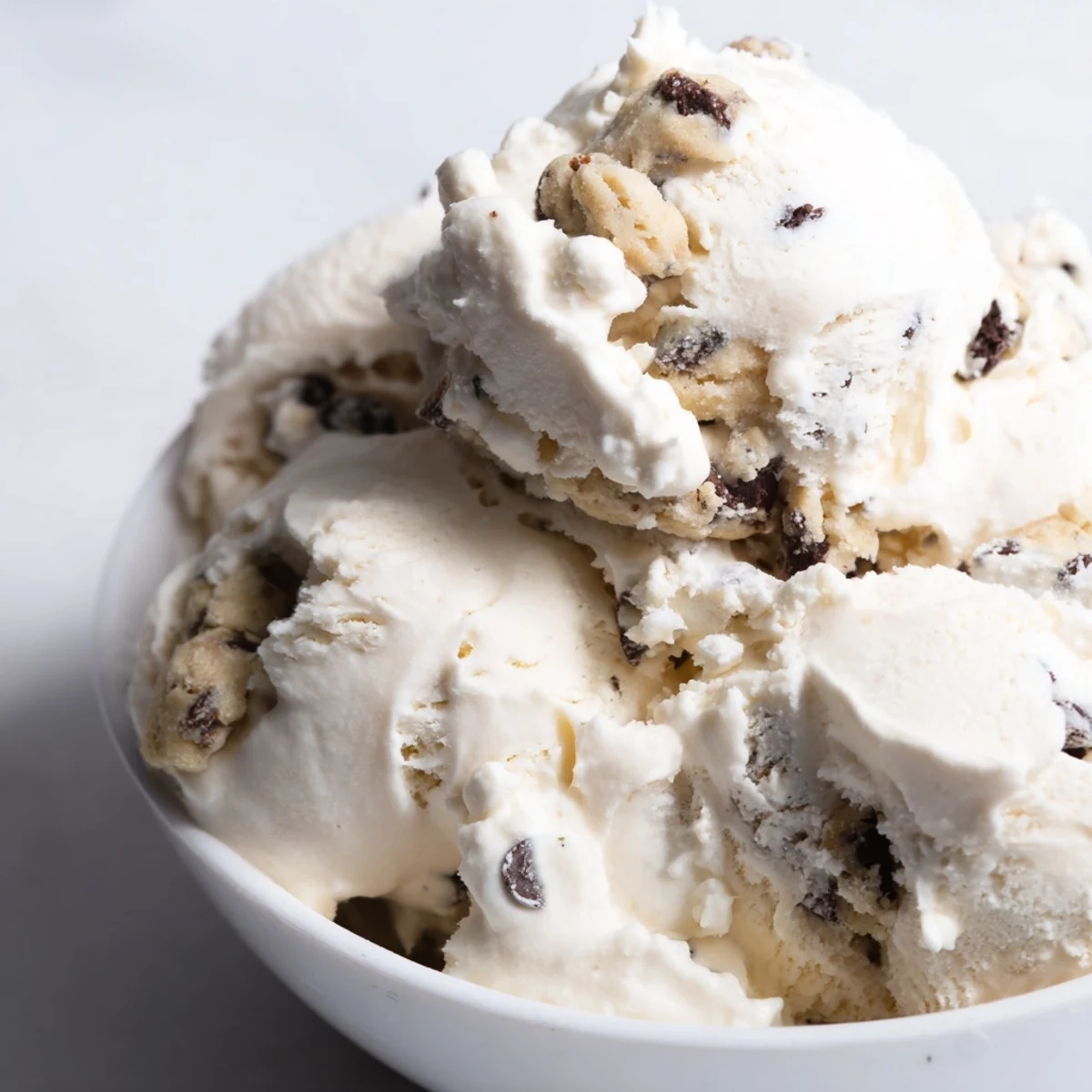 Creamy cottage cheese ice cream swirled with rich edible cookie dough bites.  