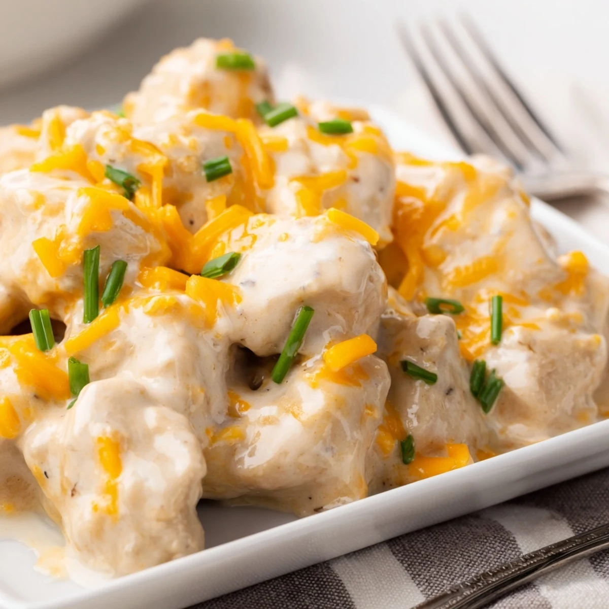 Comforting casserole featuring ranch dressing and sharp cheddar on tender chicken.  