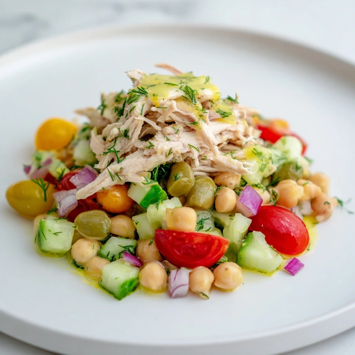 Dense Bean Salad with Lemon-Dill Chicken: A colorful salad with tender shredded chicken, perfect for lunch.