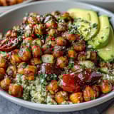 Lemon Vinaigrette Grain Bowls with Roasted Chickpeas, vibrant quinoa topped with crispy spiced chickpeas, fresh vegetables, and zesty lemon dressing.  