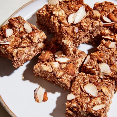 Golden brown Protein Cinnamon Almond Squares fresh from the oven, smelling warmly spiced.