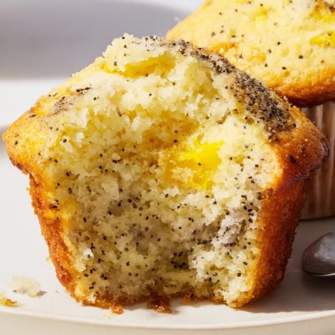 Golden Ricotta Lemon Poppyseed Muffins, fresh out of the oven, smell divine.