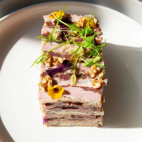 Beautiful layered Grand Canyon Rim terrine with blue cheese "river," ready to slice and serve.
