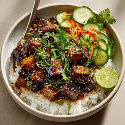 Savory and sweet miso ginger glazed eggplant bowls ready to be devoured, a Japanese-inspired weeknight meal idea.
