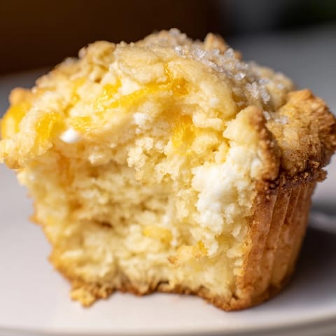 Warm, fluffy Ricotta Orange Twist Muffins: A fragrant batch fresh from the muffin tin.