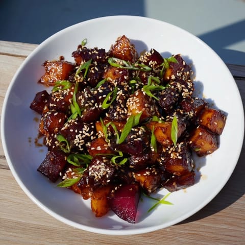 Vibrant image of miso roasted winter vegetables, perfectly caramelized, ready for a flavorful bite.