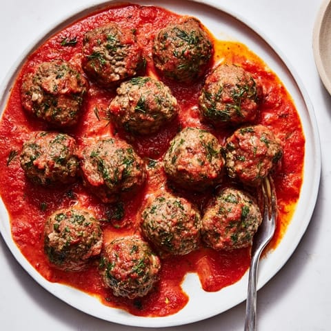 Instant Pot Greek-Style Meatballs with creamy lemon-feta, perfect for a flavorful weeknight meal.