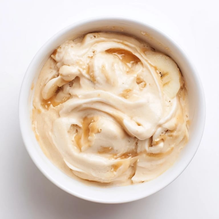 Thick and decadent Peanut Butter Banana Ice Cream, perfectly blended for a simple, healthy dessert recipe.