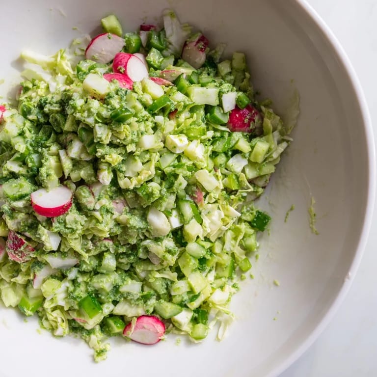 Close-up of fresh, creamy Green Goddess Cabbage Dip, served chilled as a refreshing appetizer.