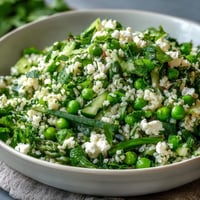 Spring Pea and Mint Couscous Salad with fresh peas and mint in a light lemon dressing, perfect for Easter or spring gatherings.